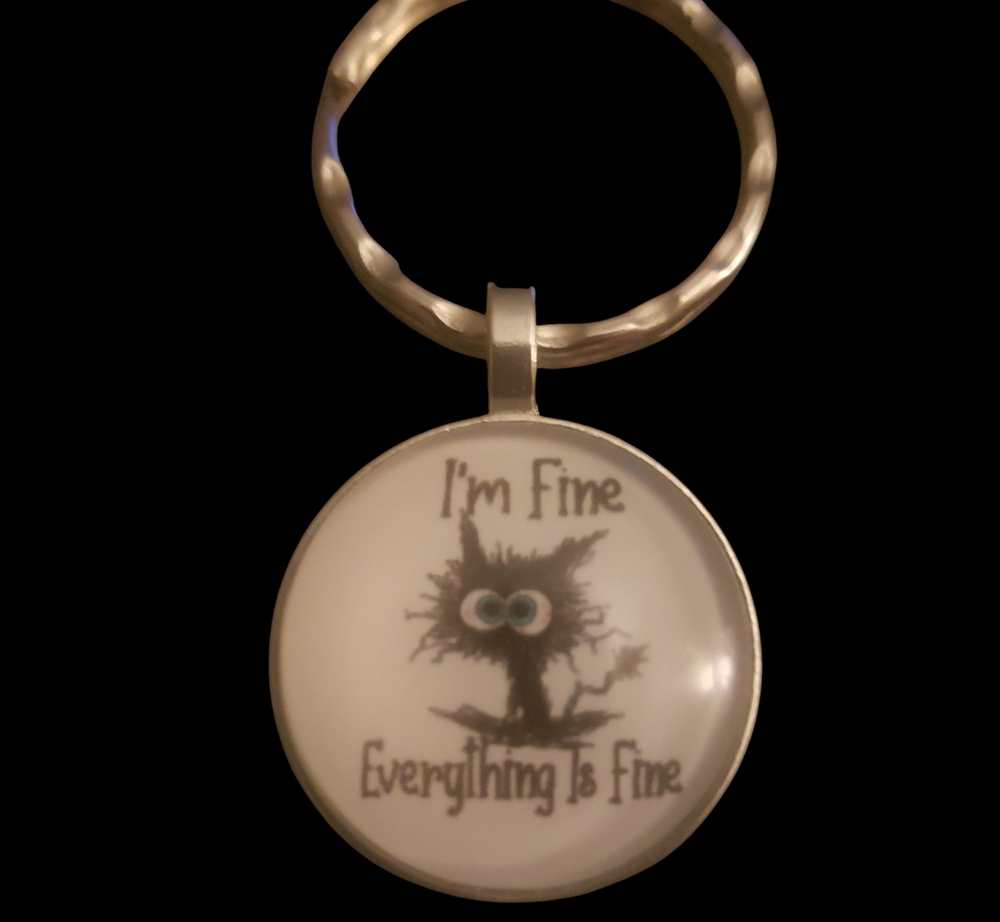 Silver Keychain with Funny Cat Design